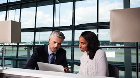 Business colleagues working in an Aspire Lounge