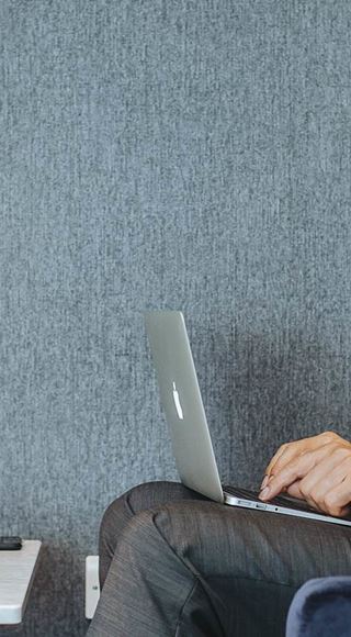 A Passenger in the Club Aspire Airport Lounge at London Heathrow Airport Terminal 3