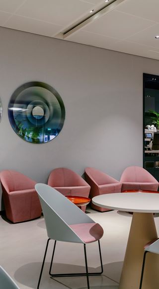 Seats and Tables At The Aspire Lounge at Amsterdam Schiphol Airport